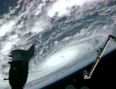 View of the hurricane from the current shuttle mission to the space station, I have no idea which way is north