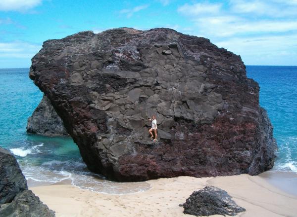 Start swimming just to the left of this house-sized boulder