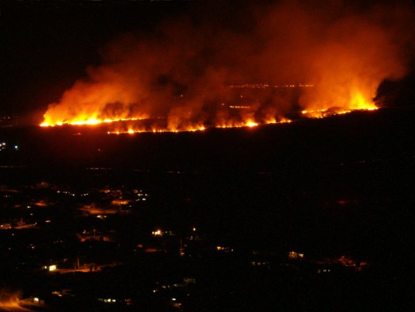 Fire spreading from the highway up to Kalepa ridge