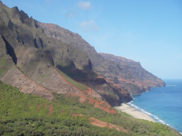 View of the lower Kalalau valley, the beach and the Na Pali coast beyond to the south